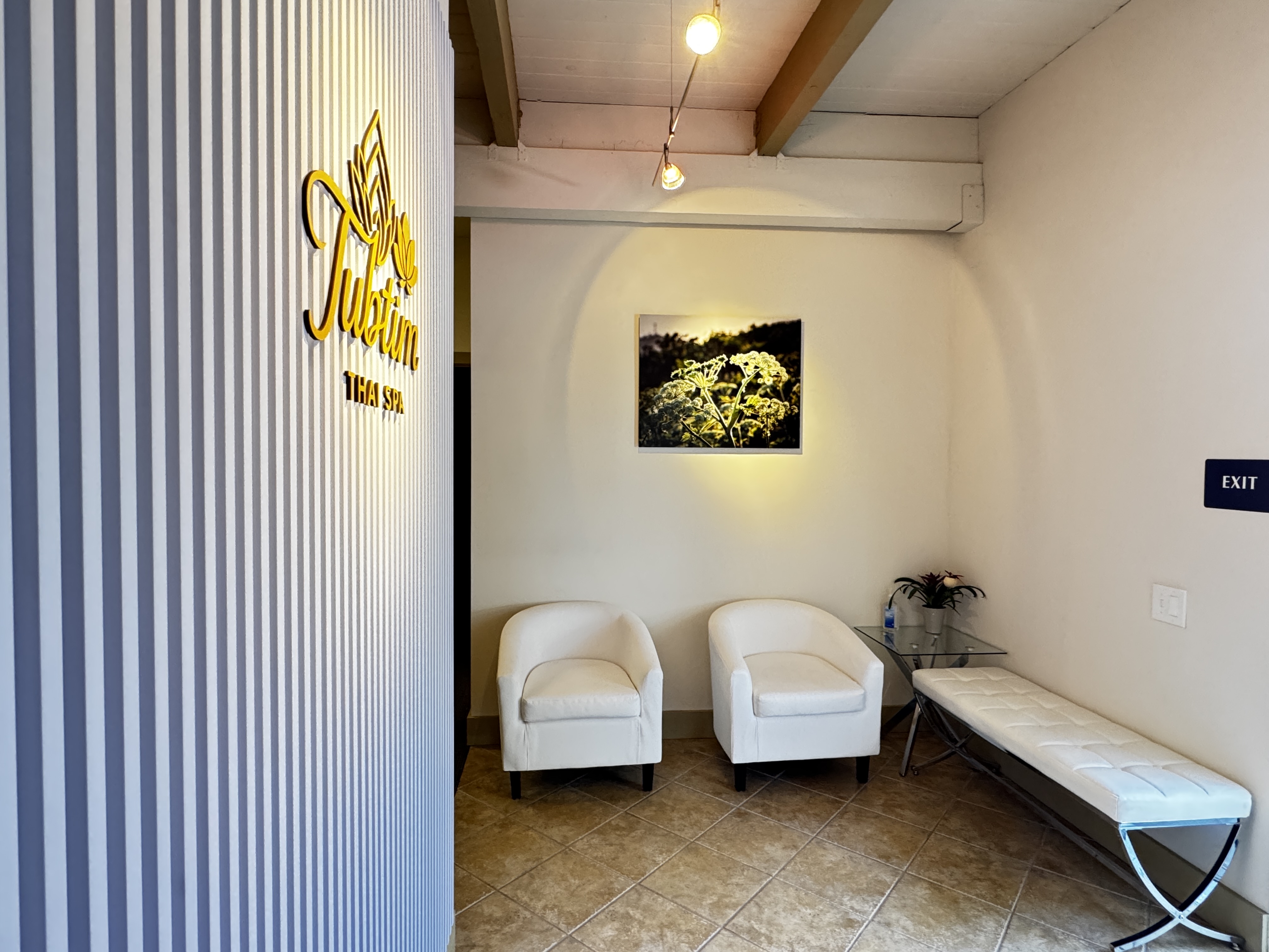 Spa reception seating area with comfortable chairs and calming ambiance